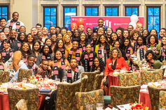 Groups Scholars pose together at a banquet